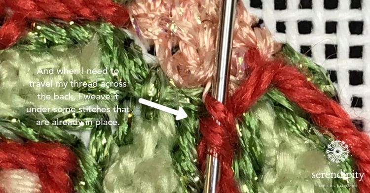 Weaving through the backs of stitches already in place to carry my thread across the back to another area... 