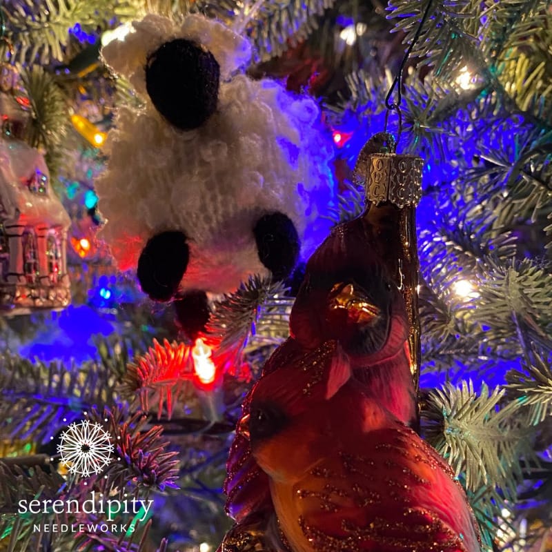 Sheep and cardinals keep watch...