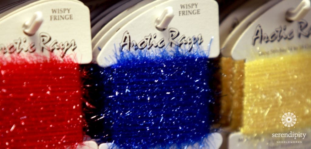 Arctic Rays is a fun novelty thread for needlepoint that looks like wispy fringe.