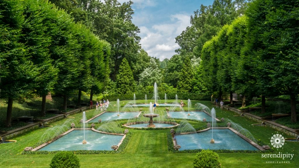 The Italian Water Garden is surrounded by beautiful trees.