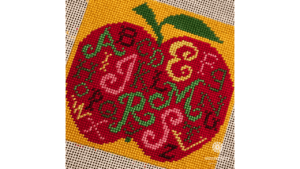 The letters on this canvas are worked in Entice.