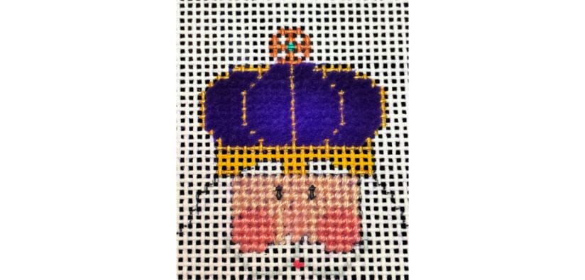Mardi Gras Santa's crown is stitched in Petite Very Velvet thread from Rainbow Gallery.