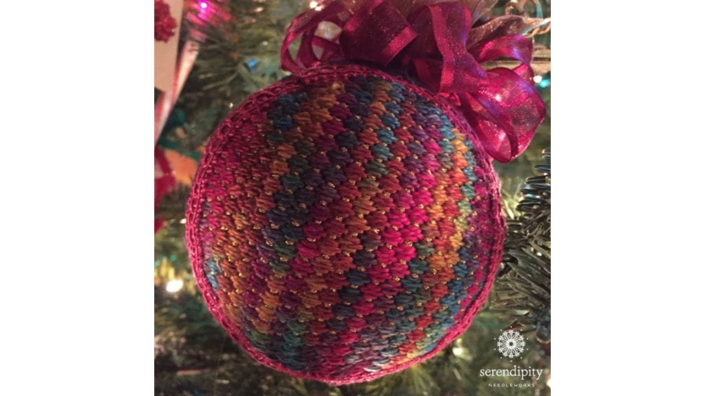 Counted canvas needlepoint designs make terrific holiday ornaments.