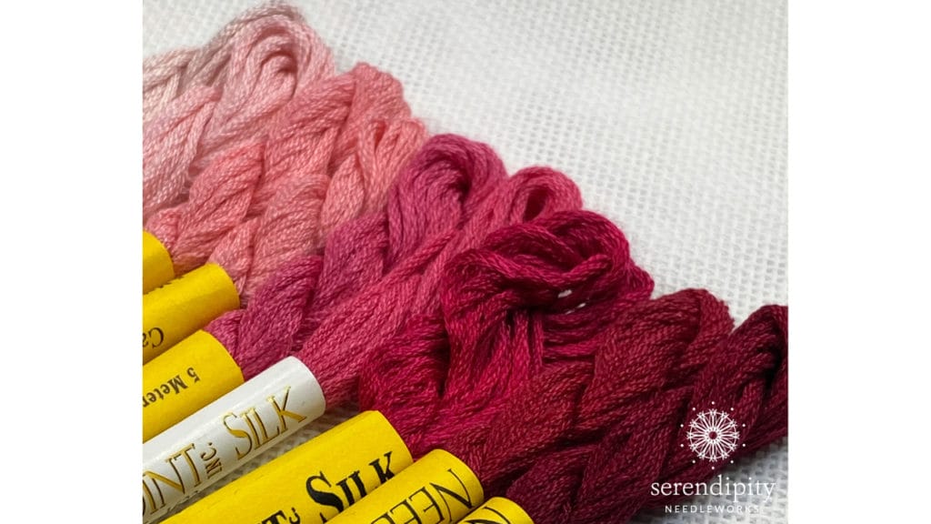 The carnation pink range is a perfect example of the lovely gradation within a color family in the Needlepoint Inc Silk thread line. 