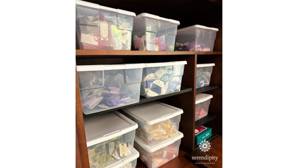 Clear storage bins provide an easy to access way to store your needlepoint threads.