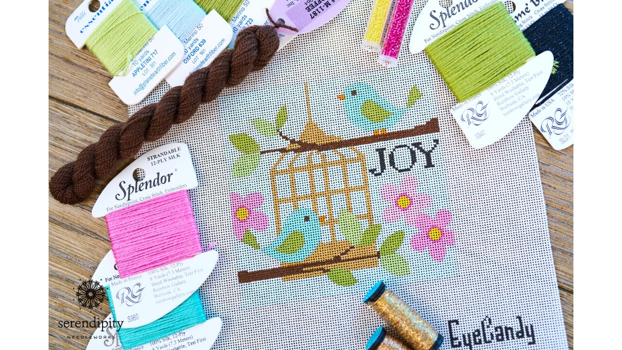 Eye Candy Designs "Joy" needlepoint canvas, featuring bluebirds and spring flowers